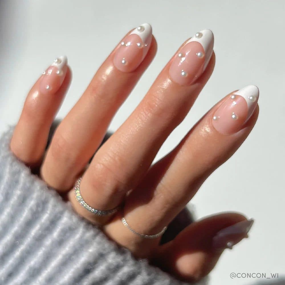 White French tips dotted with pearls
